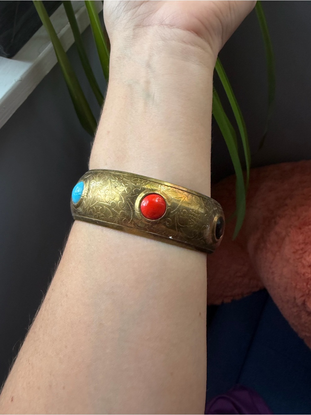 Vintage-Inspired Brass Bangle with Red, black, and Turquoise Cabochons